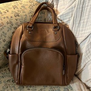 Brand new brown adjustable use backpack/purse!